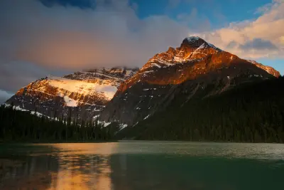 Mount Edith Cavell at sunset reflected in a calm alpine lake, Jasper National Park