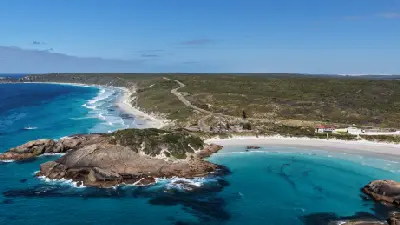 Aerial view of Great Ocean Drive between turquoise bays, white-sand beaches and granite headlands near Esperance, Western Australia.