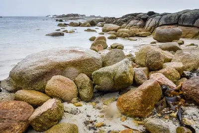 Granite boulders and rocky shoreline at Eddystone Point in northeast Tasmania.