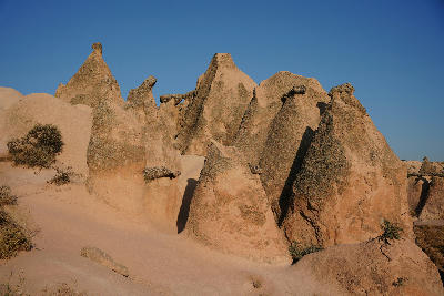 Distinctive volcanic rock formations and fairy chimneys in Devrent Valley, Cappadocia, Nevşehir Province, Turkey.