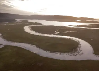 Aerial view of winding wetland channels within the Touw River Estuary near Wilderness in the Western Cape.