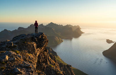 Keipen–Grytetippen ridge overlooking fjords under midnight sun, Senja, Norway
