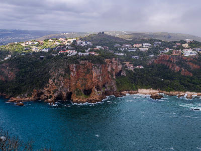 Rocky cliffs of Knysna Heads overlooking the entrance to Knysna Lagoon on South Africa’s Garden Route.