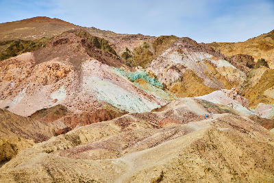 Artist’s Palette colourful hills with hikers Death Valley California