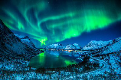 Aurora borealis over a Norwegian fjord