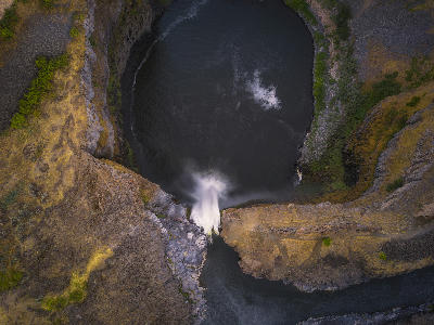 Aerial view looking directly down over Palouse Falls and its circular plunge basin in Washington State