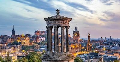 Dugald Stewart Monument on Calton Hill with panoramic views of Edinburgh Castle and the Old Town skyline.