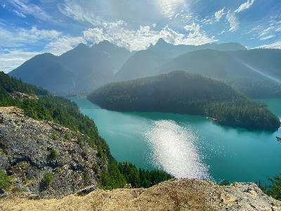 Ross Lake North Cascades Washington turquoise glacial lake surrounded by forest and mountain peaks