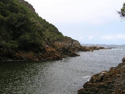Storms River Suspension Bridge crossing the river mouth in Tsitsikamma National Park on South Africa's Garden Route, a landmark on the Otter Trail.