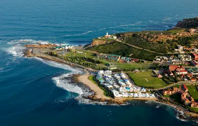 Aerial view of The Point peninsula and Cape St. Blaize Lighthouse in Mossel Bay, South Africa