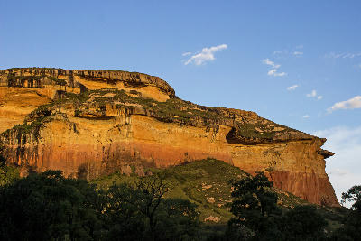 Mushroom Rock glowing in late afternoon sunlight in Golden Gate Highlands National Park near Clarens, Free State, South Africa.