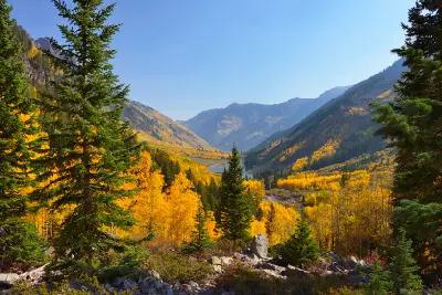 Maroon Creek Valley with golden aspens overlooking Maroon Lake and Elk Mountains, Aspen Colorado