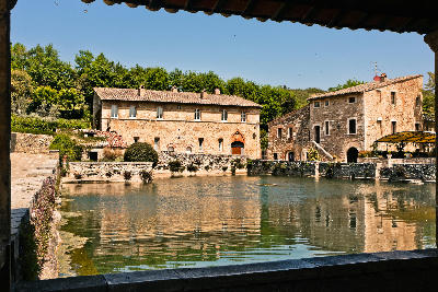 Thermal pool in the central square of Bagno Vignoni in Val d'Orcia, Tuscany, Italy.