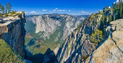 Cliff edge view from Taft Point looking across Yosemite Valley to El Capitan