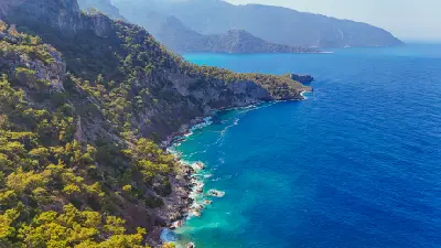 Rocky Mediterranean coastline between Butterfly Valley and Kabak Bay near Fethiye, Turkey.