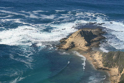 Aerial view of Gericke's Point sandstone headland and tidal rock platforms near Sedgefield, Garden Route.
