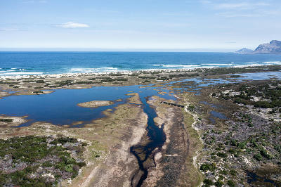 Aerial view of Rooisand wetlands and coastal estuary near Kleinmond in South Africa
