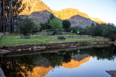 Stream reflections and sandstone mountain cliffs at Algeria Camp in the Cederberg Mountains of the Western Cape, South Africa.