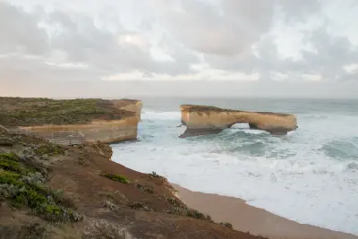 London Arch viewed beside the coastal lookout and cliffs in Port Campbell National Park, Victoria.