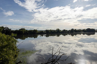 Clouds reflected on the still waters of Marais Dam in Rietvlei Nature Reserve near Pretoria.