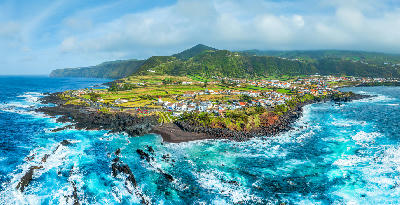 Mosteiros Beach and coastal village on the volcanic west coast of São Miguel Island in the Azores.