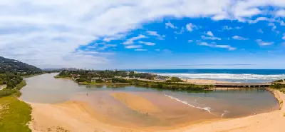 Aerial view of the Touw River Estuary at Wilderness, showing sandbanks, the river mouth and the Indian Ocean along South Africa's Garden Route.