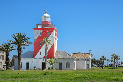 Green Point Lighthouse with its red and white diagonal stripes in Cape Town, South Africa.