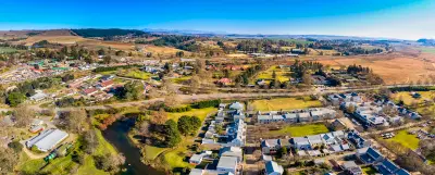 Drone view of Nottingham Road village with rivers, farmland and country properties in the KwaZulu-Natal Midlands, South Africa.