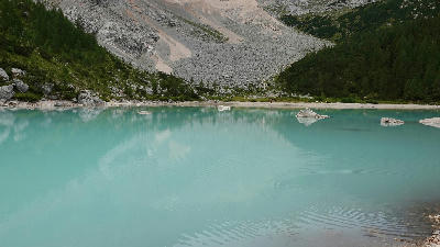 Turquoise Lago di Sorapis glacial lake in the Dolomites near Cortina d'Ampezzo, Italy.
