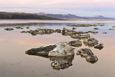 Mono Lake calm water rocks pastel sunset Mono Basin Eastern Sierra California