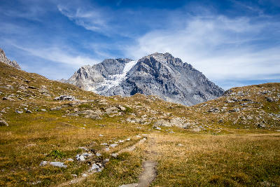 Hiking path leading toward Grande Casse glacier in Vanoise National Park, French Alps