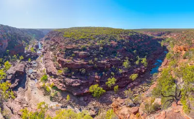 Elevated view across Z Bend showing the Murchison River winding around a broad red sandstone ridge between steep gorge walls.