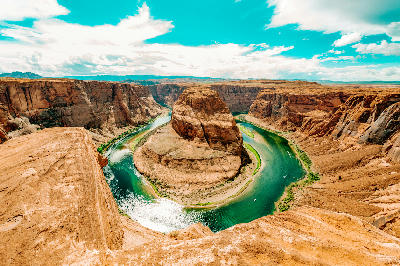 Horseshoe Bend Colorado River bright daylight full curve sandstone canyon Page Arizona wide angle view