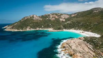 Aerial view of Little Beach, turquoise water and granite mountains in Two Peoples Bay Nature Reserve near Albany, Western Australia.