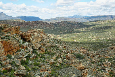 Sandstone valleys and rugged rock formations viewed from Stadsaal Caves in the Cederberg Mountains, South Africa.
