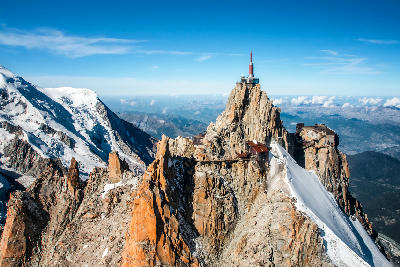 Aiguille du Midi summit with observation structures and surrounding peaks and glaciers in the Mont Blanc Massif, French Alps.